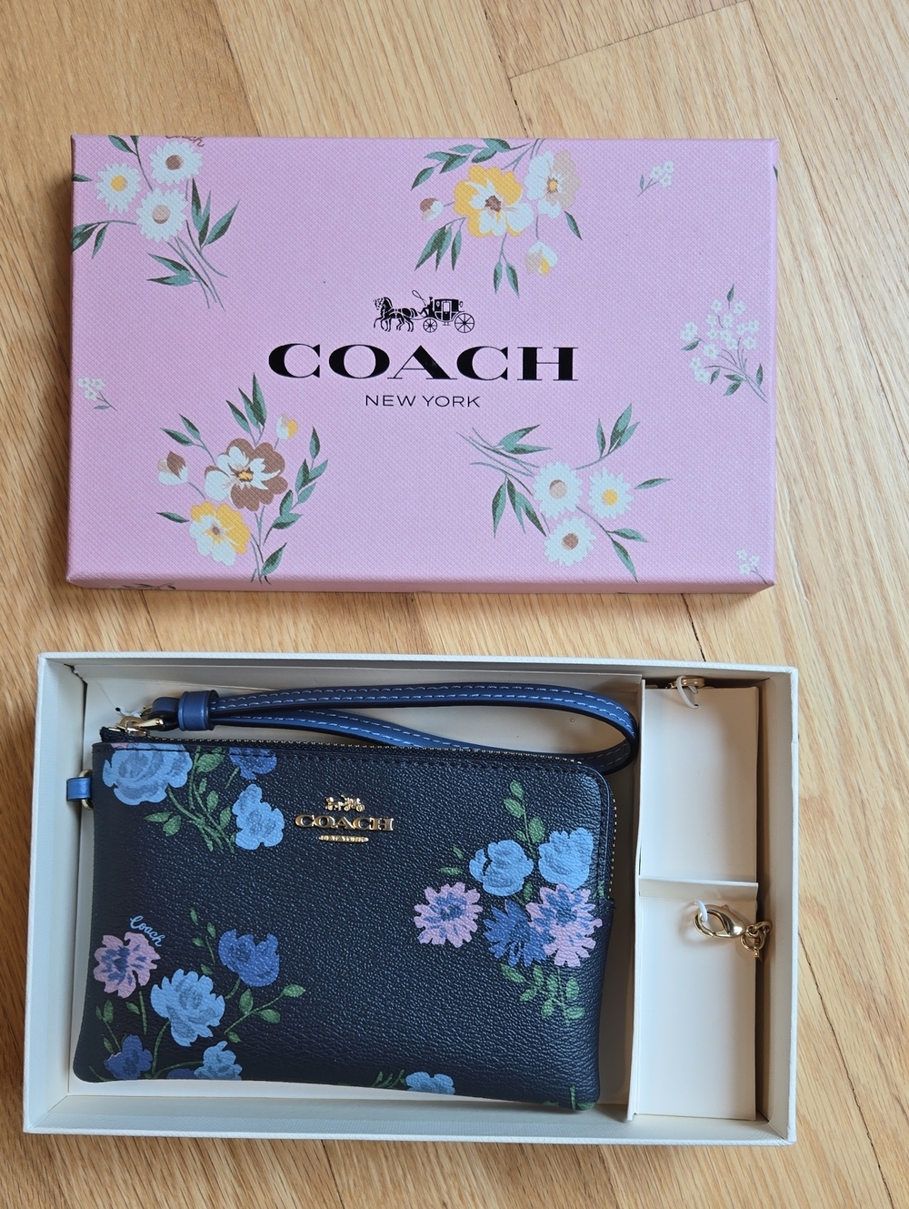COACH Floral Wristlet with Blue and Pink Blooms